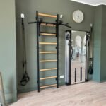 BenchK 731 Swedish Ladder Wall Bar with Convertible 6-Grip Pull-Up Bar & Barbell Holder view 2